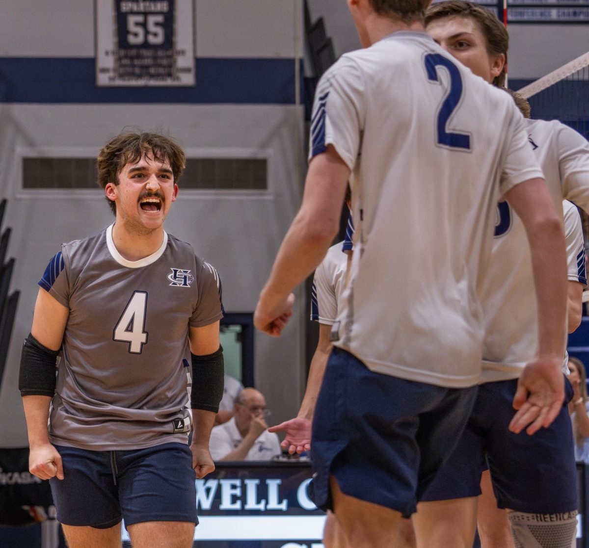 Screaming with pride, Braden Harton makes his way to one of his teammates who had just spiked the ball and earned a point for the team. Players on the team helped to boost each other’s energy despite the constant back-and-forth of the game on May 22.
