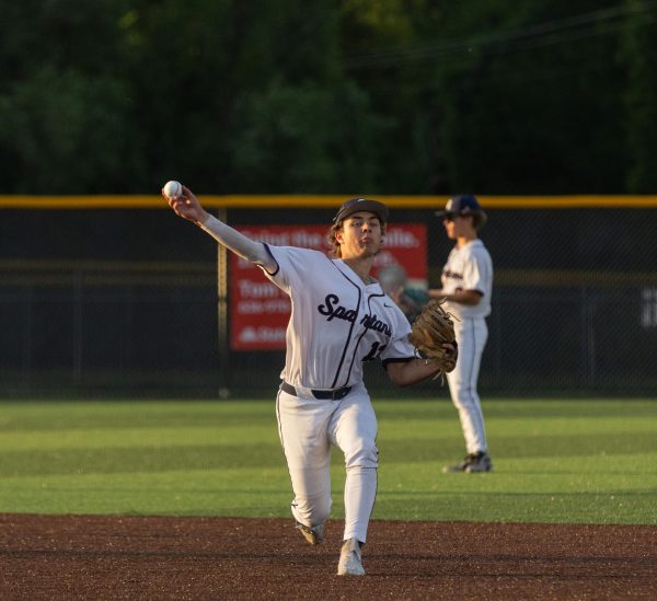 In between innings freshman Jackson Elliott fields a ground ball from his first baseman to work on last minute reps before the first batter. Elliott waited for his catcher to throw down to second so he could throw around the horn with the rest of the infield.