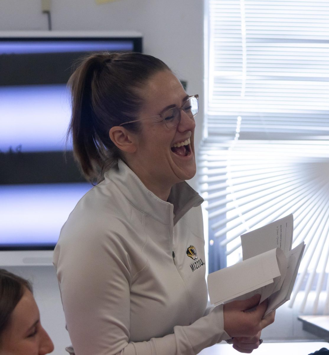 As she passes out an assignment, Fetsch stops to laugh with a group. For her students, it’s easy to
feel comfortable enough in her class to laugh and joke.