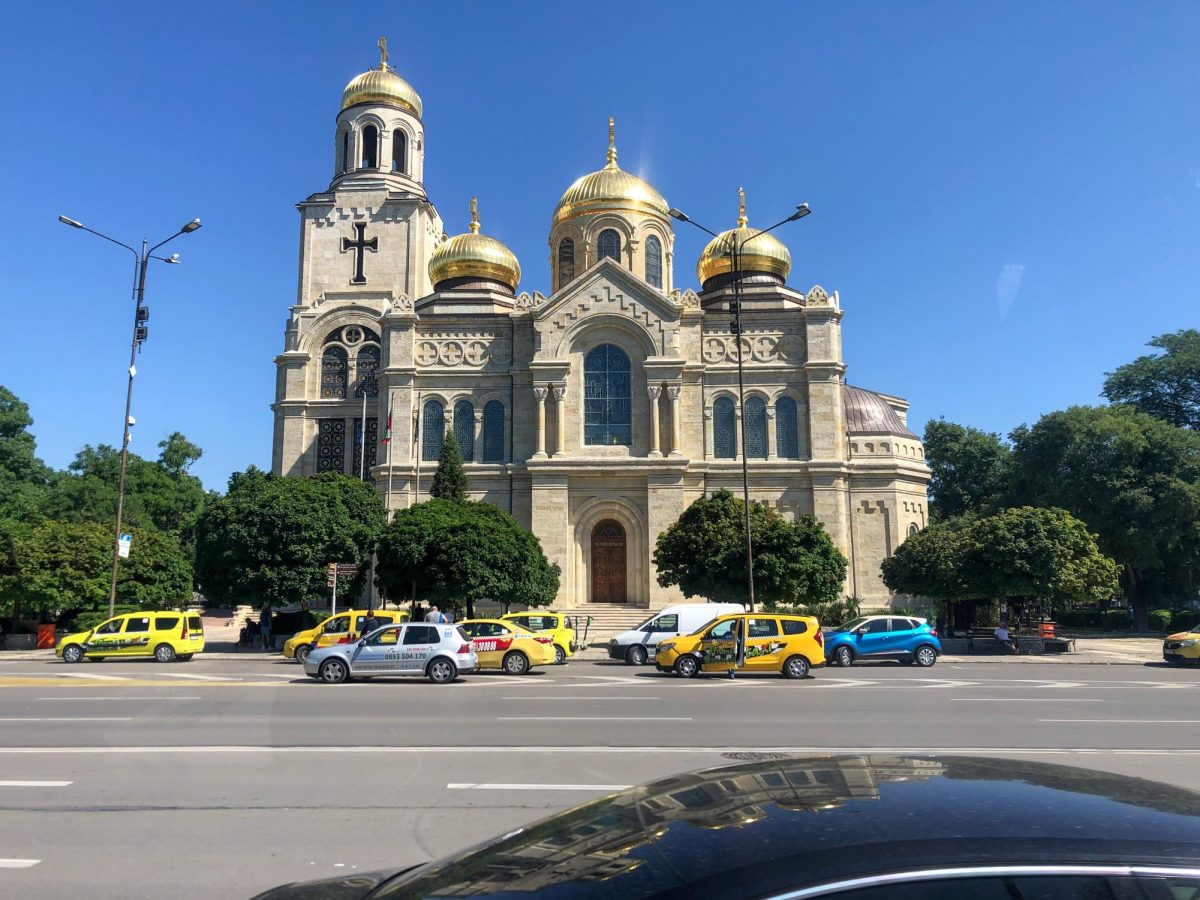 A picture of The Dormition of the Mother of God cathedral in Varna, Bulgaria. According to a 2021 census, 69.5% of Bulgaria identifies as Eastern Orthodox Christian, and many churches are characterized by their domes. Photo by Nadia Manuschev.