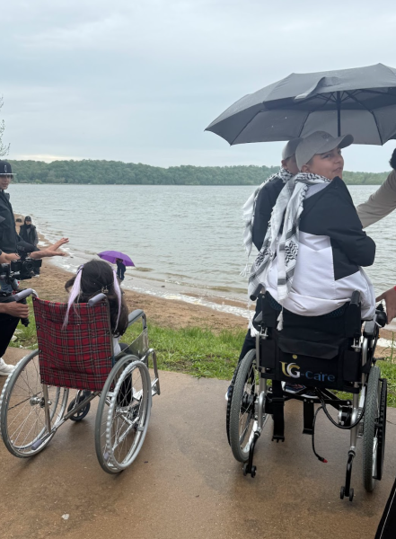 Tala (left) and Mustafa (right) gaze upon the Creve Couer Lake. Both children are amputees from Gaza seeking medical care in St. Louis.