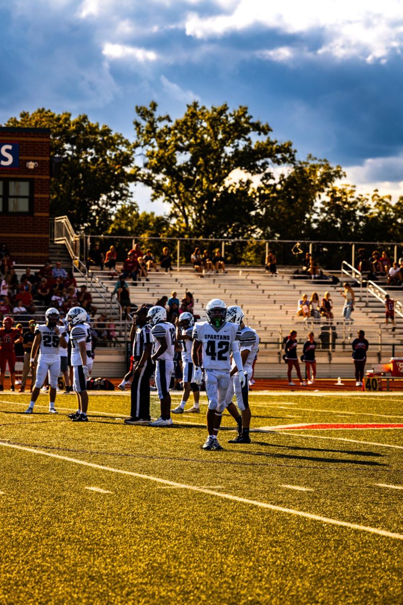 Sophomore AJ Beasley defensively gets ready for the hard-fighting Liberty offense. Beasley struggles getting time with the Varsity squad but gets things done on the C-Team side.  
