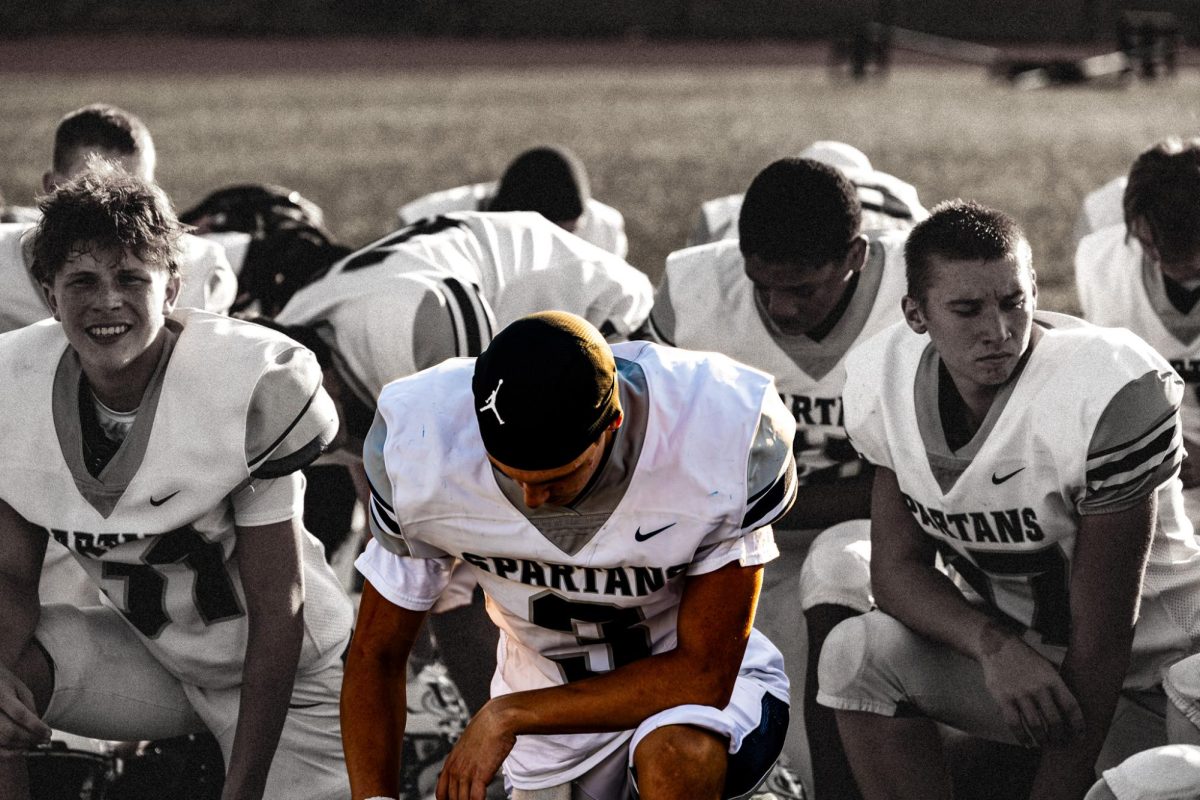 Freshman Sam Aholt is thinking hard on how he can help his team come back. The Spartans were down 28-14 at the half.
