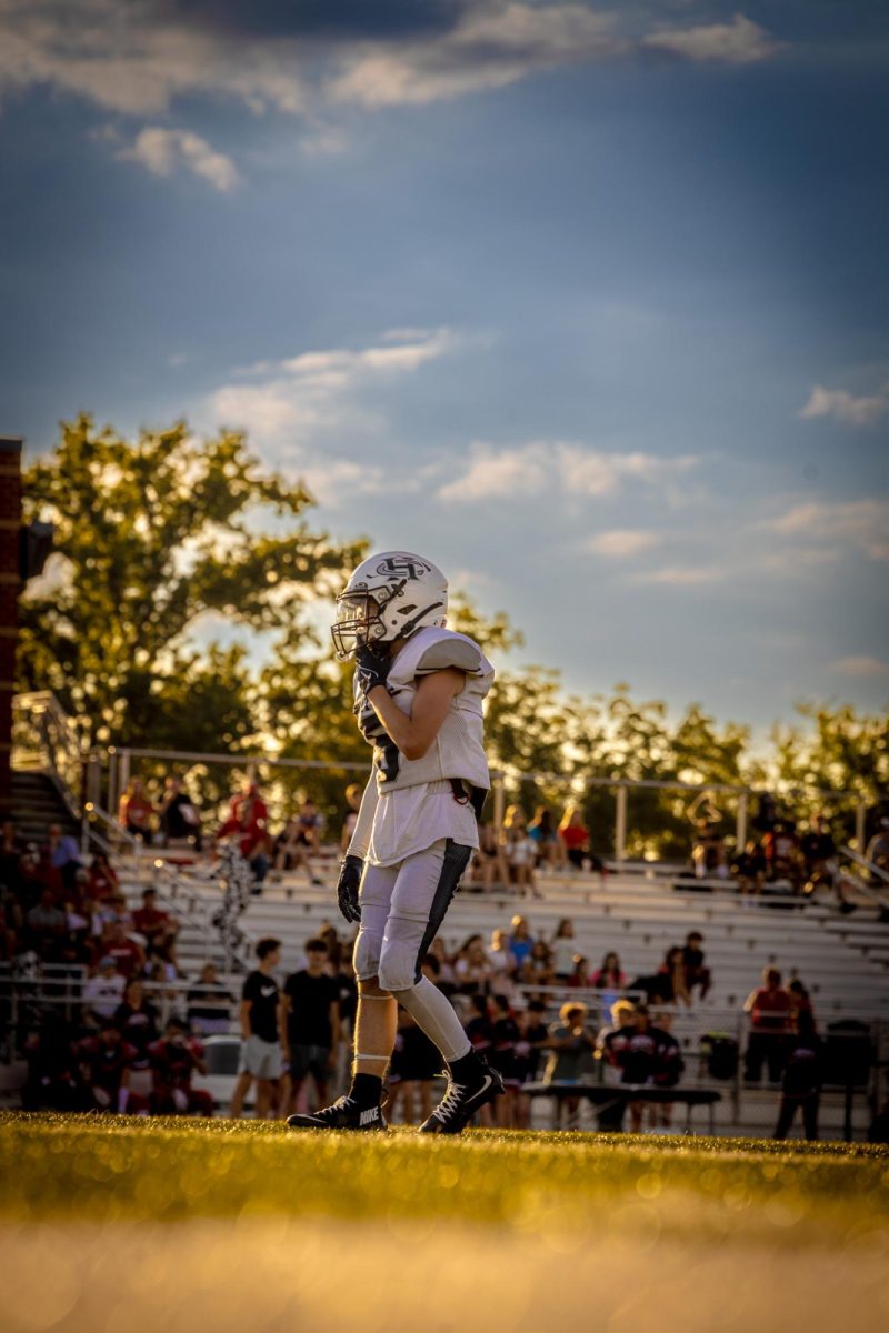 Freshman safety Patrick Holleran lines up over the ball and waits to cap the wide receiver's route. Holleran did a very good job of not letting anyone get behind him or the entire defense. 

