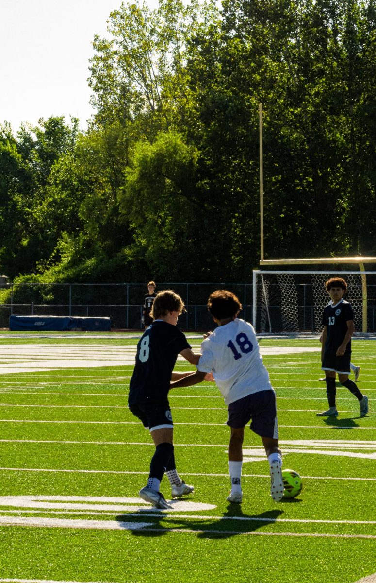 Sophomore Cooper Eubanks sheds through defenders. He maintains the lead they have in this game.