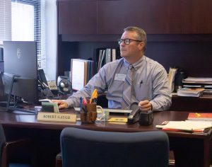 Dr. Robert Gaugh works at his desk. Gaugh is serving as interim principal this school year while the district has been roiled by issues surrounding the hiring and departure of Superintendent Mike Dominguez, who only worked for a month in FHSD and then was given $230,000 as part of a separation agreement. 