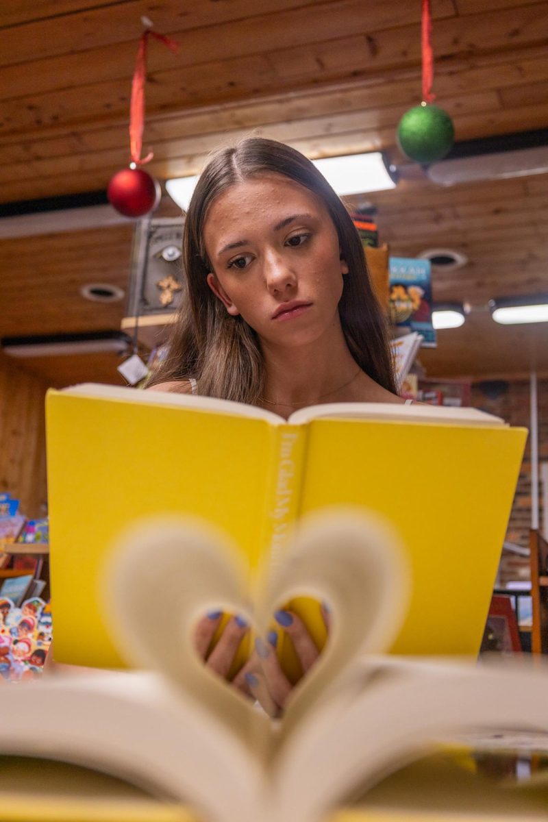Down on Main Street, there's a book store called Main Street Books, a family owned book store that has been in junior Nadia Moores family for around 32 years. Moore found her love for books at a very young age when reading "Brown Bear brown Bear," and as she got older, she only deepened her love for books. Moores favorite book now is, "I'm Glad My Mother Died" by Jennette McCurdy, which is featured in this photo.