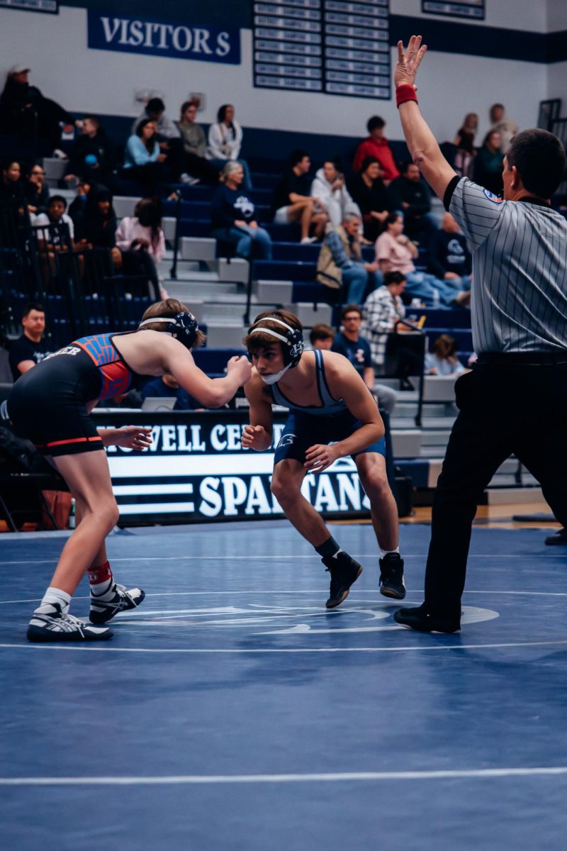 Junior Brayden Roussin keeps eyes locked on his opponent watching his moves carefully on Jan. 7. He made sure to keep his foundation strong in the event of an attack by the opposing player. 
