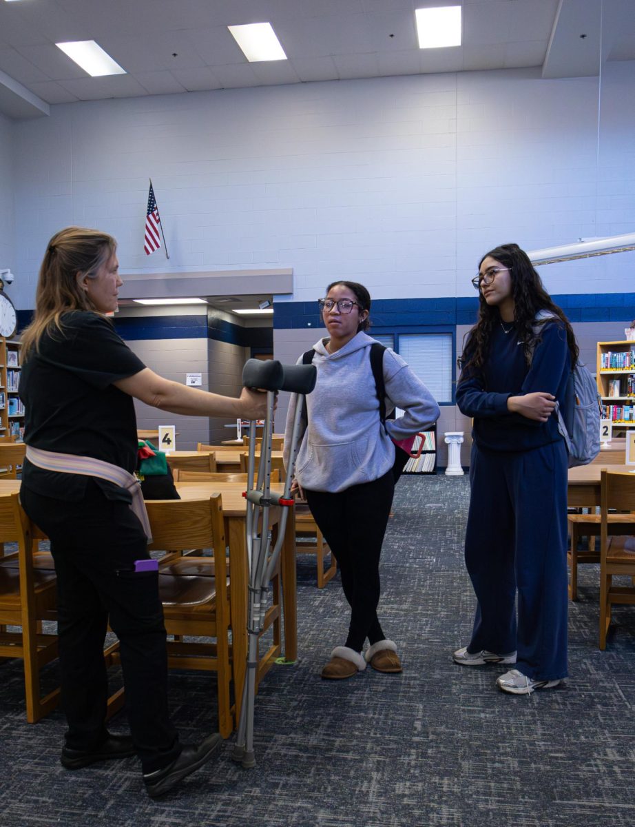 The Real World  Wednesday on Jan. 14 is finishing up and students are allowed to ask physical therapist Amanda Stapleton-Cloud questions regarding her occupation. Sophomores Regina Gil-Farias & Ava Gordils listened attentively as they had asked questions interested more on how she deals with difficult situations in a tranquil situation. 
