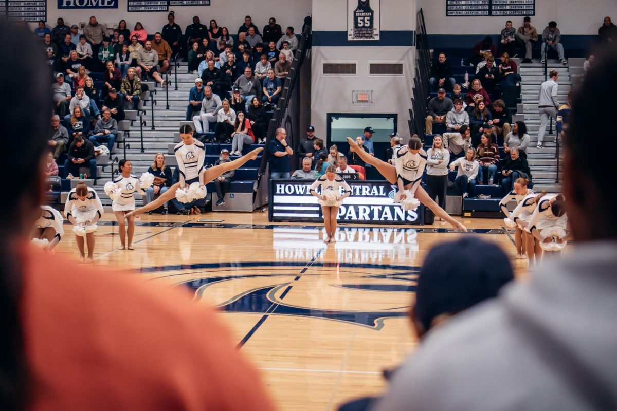 Sensations putting on their half time performance on Jan. 20. The crowd watched as the Sensations executed various moves including flips, cartwheels, and splits. 
