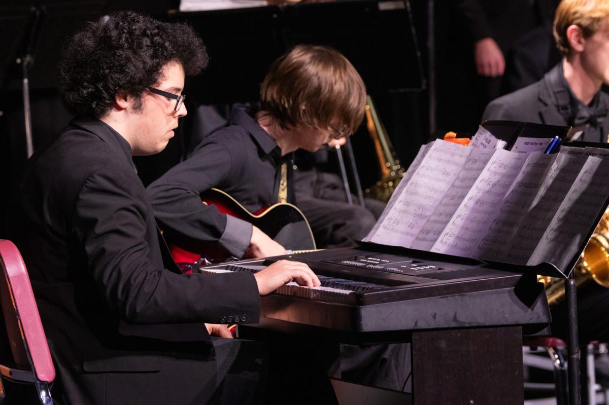 Sophomore Kieren Kelly plays piano during the jazz concert on Dec. 10. Kelly also plays alto sax and in the past has been involved in Howell High Schools winter drumline.