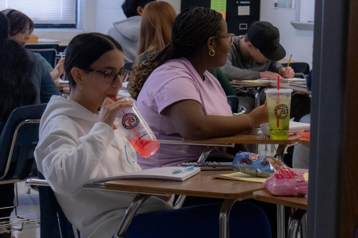 Annabelle Edwards and Layla Westley drink 7Brews' 7Energy drinks during Mrs. Fetch's Algebra 2. This is a growing occurrence as students gain access to energy drinks at lunch and over flex hours.