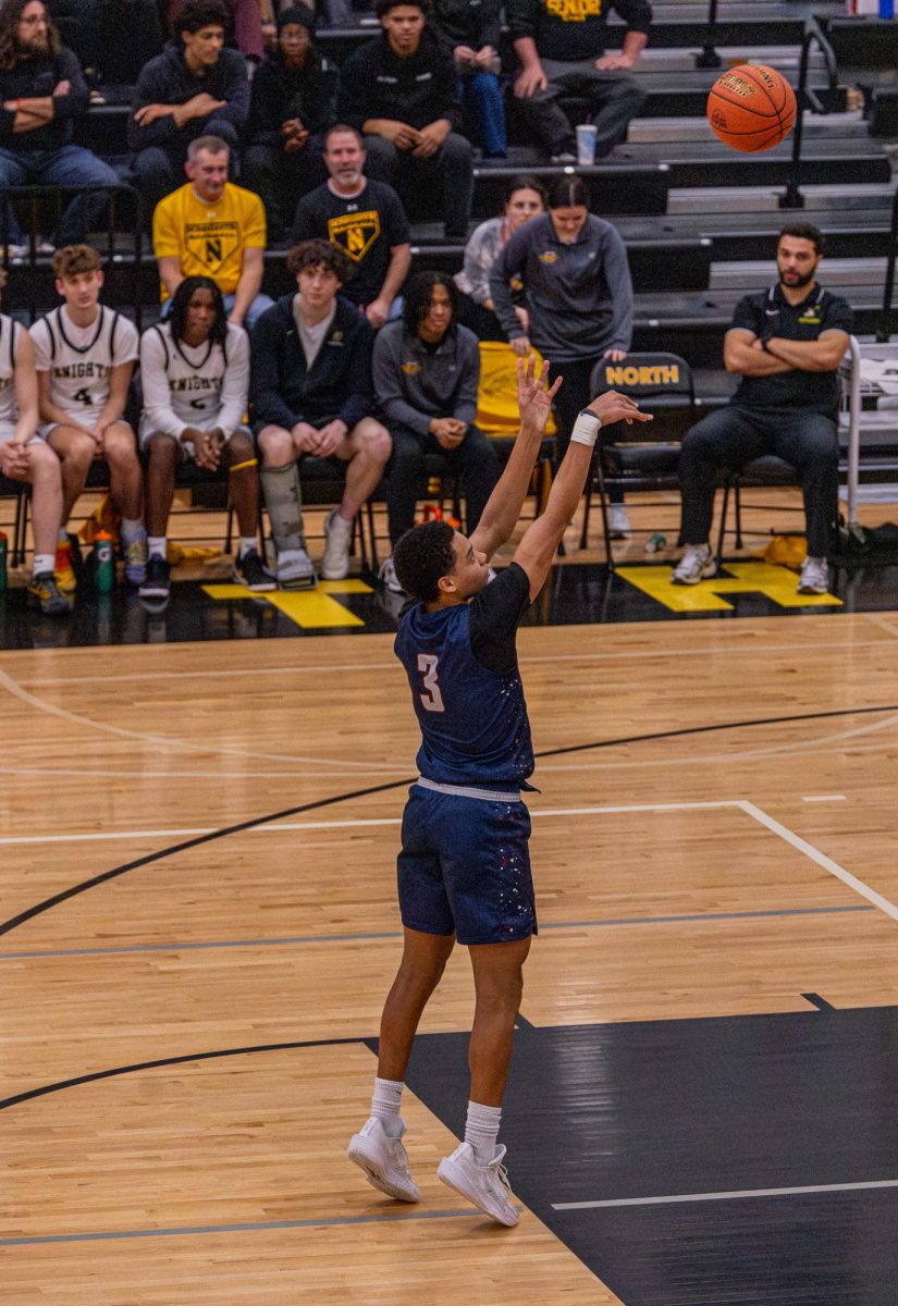 Junior Jamarious Britt shoots a freethrow for a technical foul on Mar. 27.
Britt shot a total of & freethrows in this battery for three Technical fouls.
