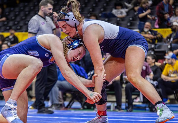 Locking her opponent in place with a mantis lock, Halen Phillips pressures down with her chest. Phillips continued to win this match by pin.