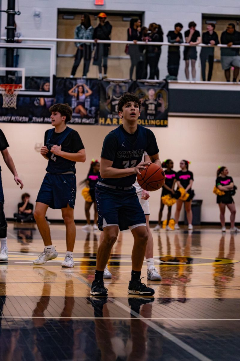 Senior Tyson Hackmann shoots a free throw against Howell North on Mar. 27. Hackmann is a skilled shooter, and makes the shot.
