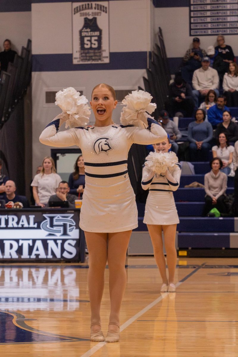 The Spartan Sensations are dancing, and senior Olivia Rothermich shows the expressions that are part of the dance. She bends her arms up by her face and steps on her toes on Feb. 20.