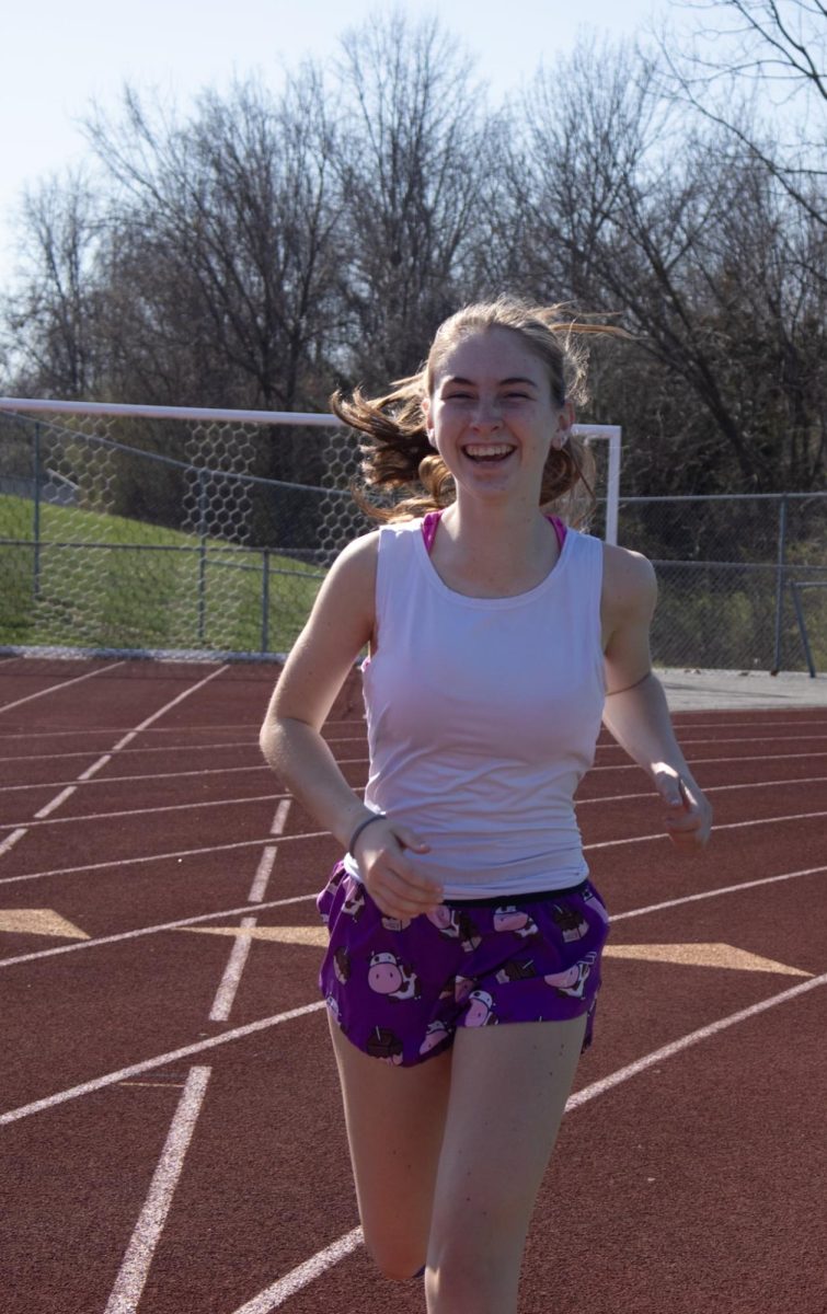 Junior Mackensie Uglum enjoys running on the FHC track. Spending time running is an effective way people can increase both their mental and physical health.