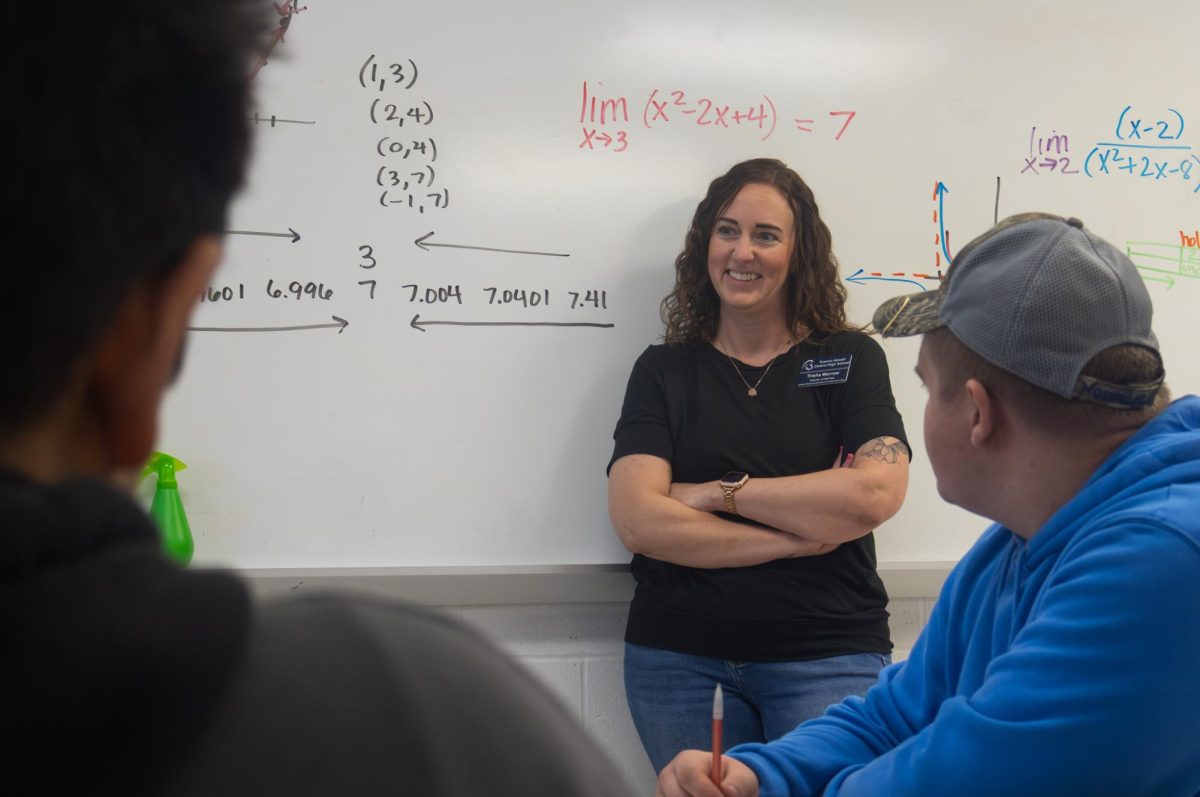 Before beginning her lesson on geometry, Mrs. Tricia Morrow likes to ask her students about their weekends and how their day is going. She smiles as her students talk about the exciting things they’ve done and their plans for next weekend.