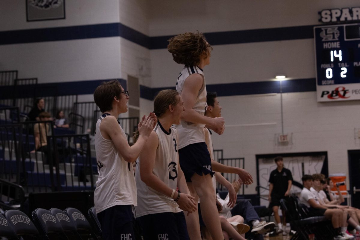 After the Spartans won the point on April 23, the players on the sidelines cheered. Cheering after every point demoralized the opposing team, allowing for the Spartans to win 2-0.