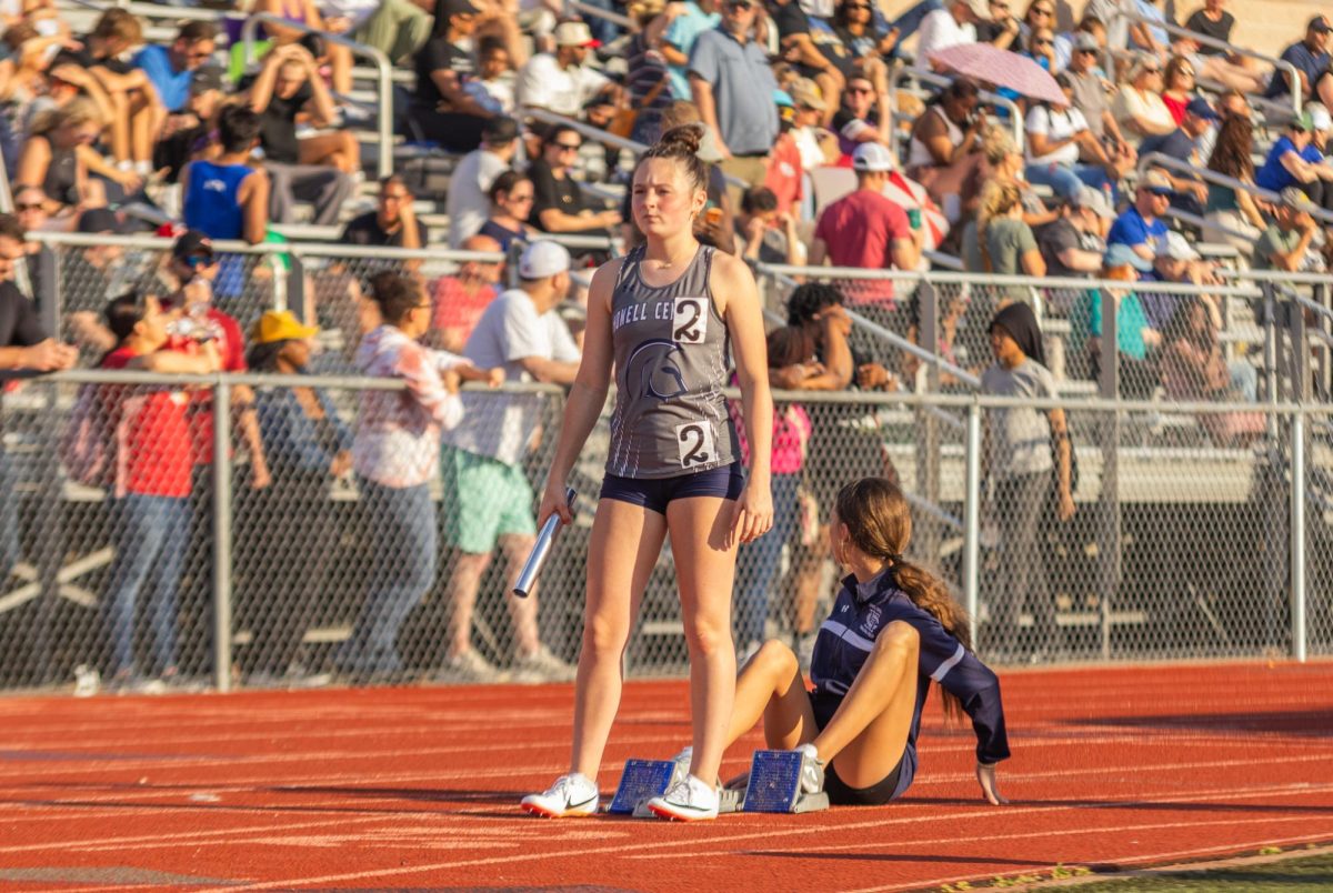 Sophomore Callie Abrams focused on the straightaway ahead of her while preparing to start the 4x100m relay at the Timberland JV meet on Apr.9.
