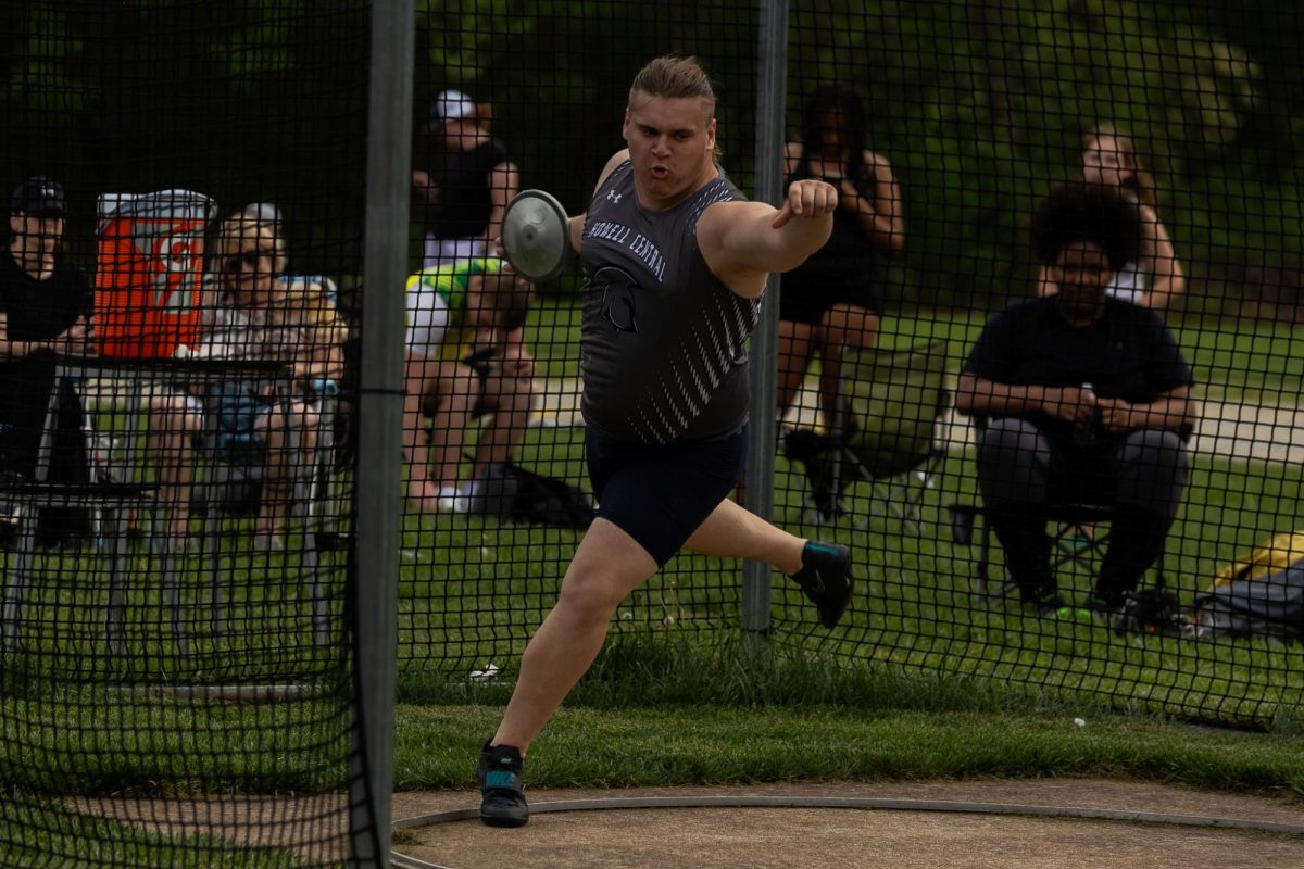 Senior Matt Hopkins throws discus for one of his other throwing events. Discus is another event that the throwing team participates in and is similar to shotput. 