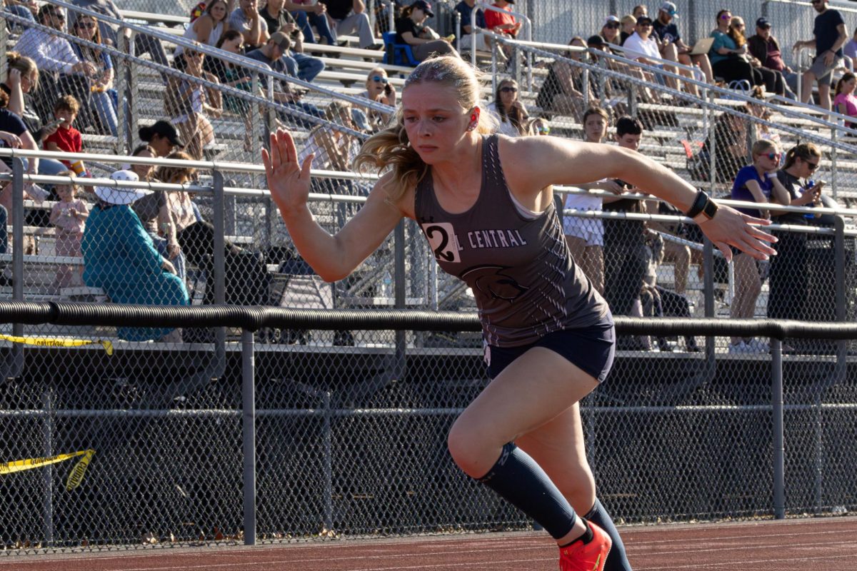 Blowing explosive speed on April 21 during her race at the Bob Breuer track meet for the last time running on her home track. Senior Erin Getgood bursted from her blocks catching up with her opponents from her extension and stride when she had come out of her set form.
