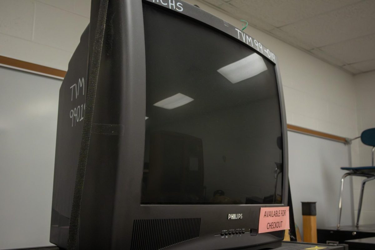 A retro computer sits alone in the back of a storage room. This symbolizes the rapid innovation of technology to become more advanced.